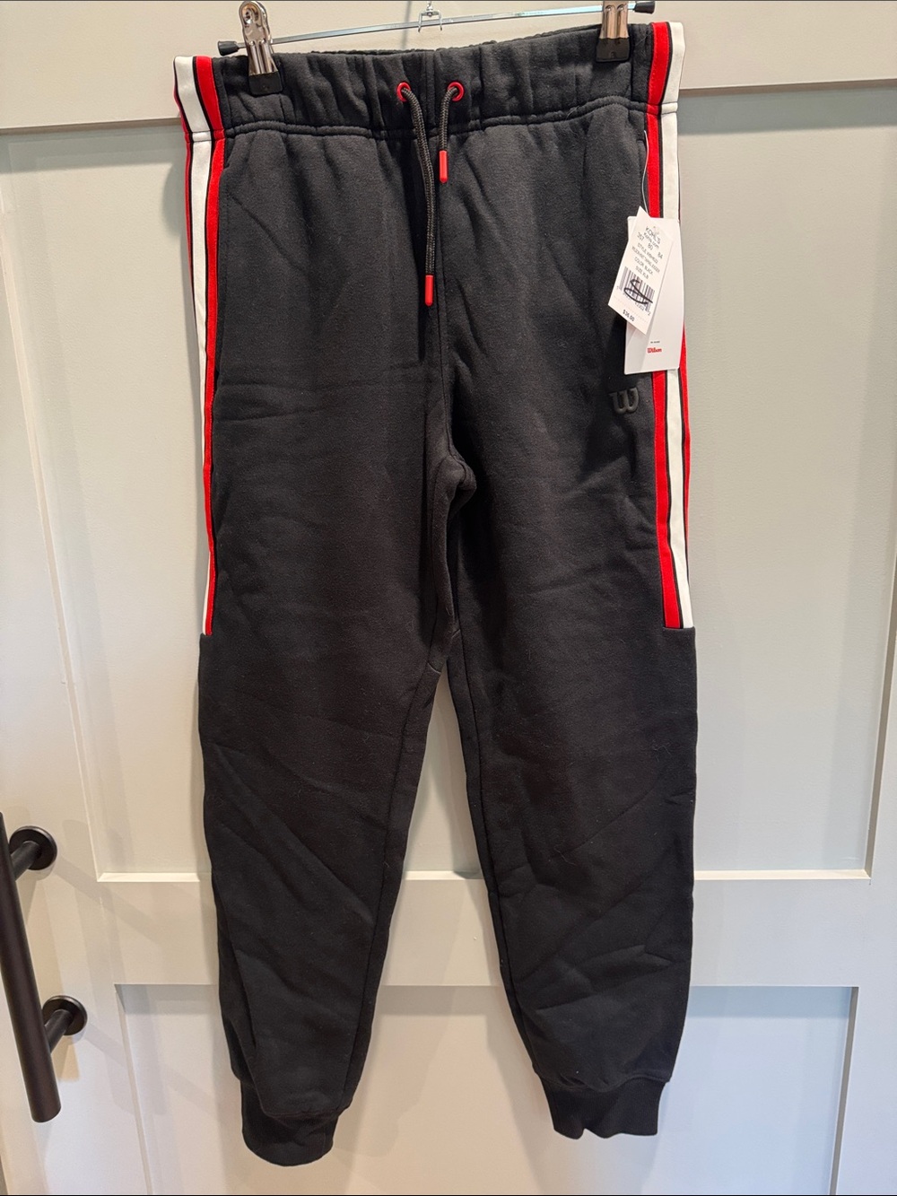 Wilson Black Kids Joggers with Red & White Side Stripes